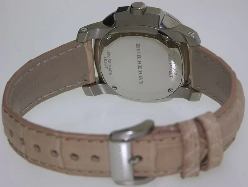 Burberry The Britain Diamonds watch worn on wrist with pink leather strap