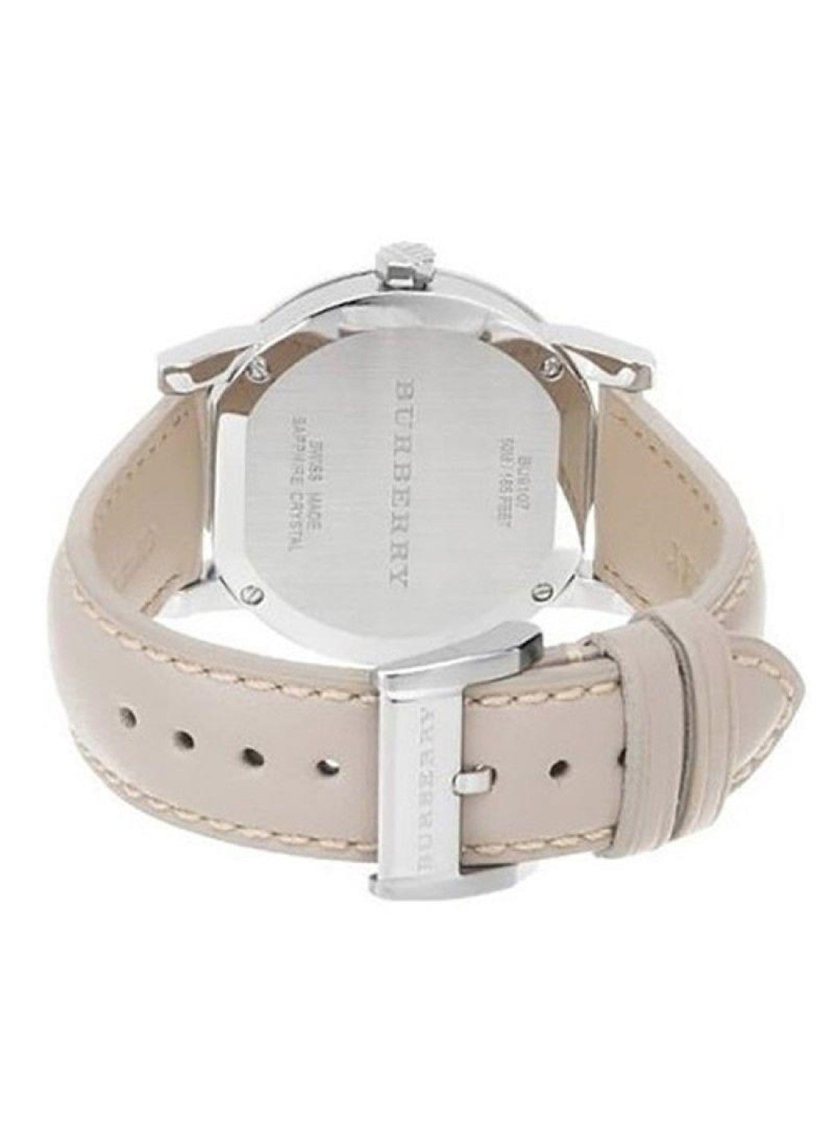 Burberry The City watch on wrist showing tan leather strap and silver case with date window