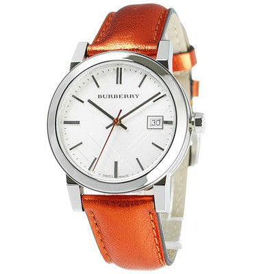 Burberry The City watch angled view showing orange leather strap and silver case