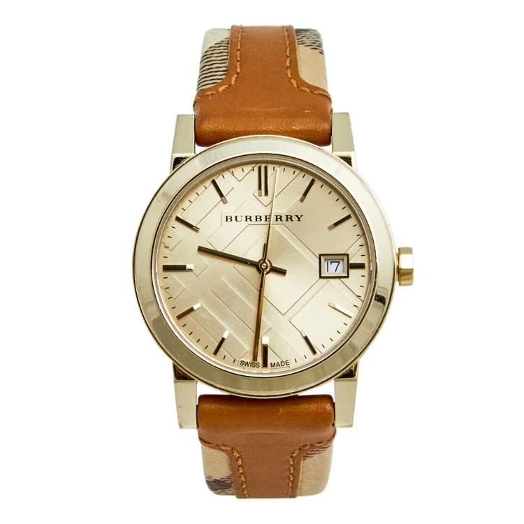 Burberry The City ladies watch with champagne dial, tan leather and striped fabric trim strap, gold-tone case