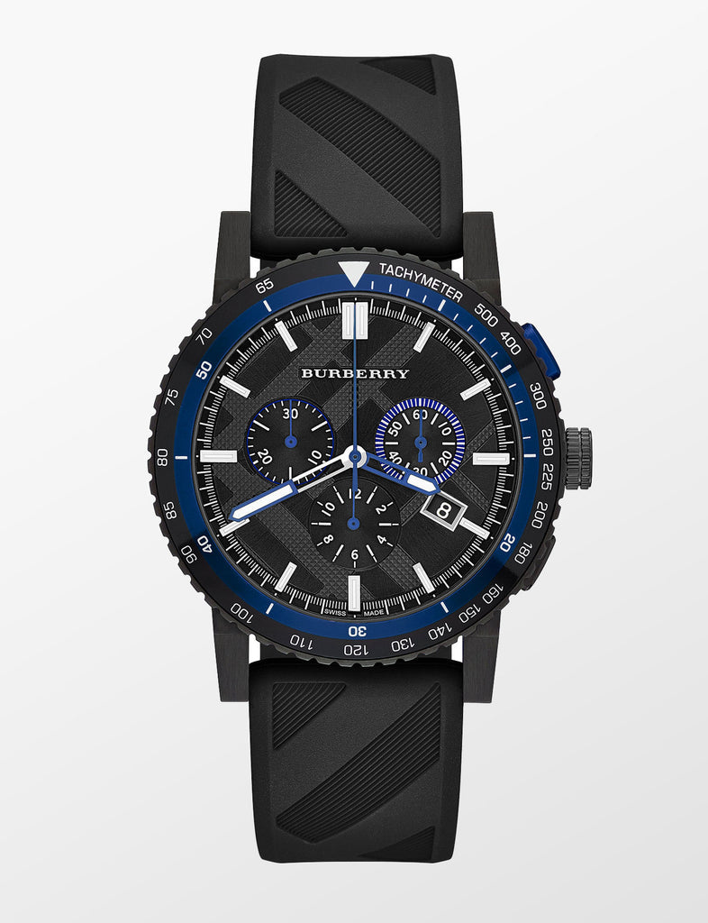 Burberry The City chronograph watch with black dial, blue bezel, and black rubber strap