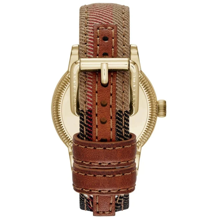 Caseback of Burberry Utilitarian BU7853 showing leather strap detail and gold-tone case