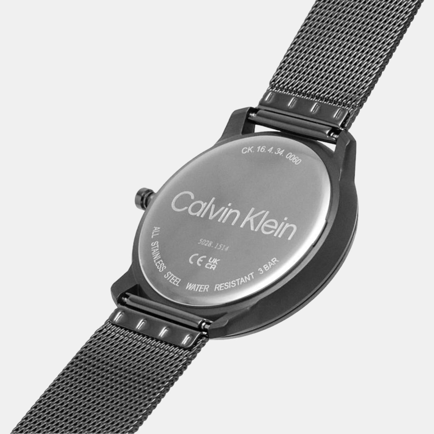 Calvin Klein watch caseback detail with engraved branding and specifications