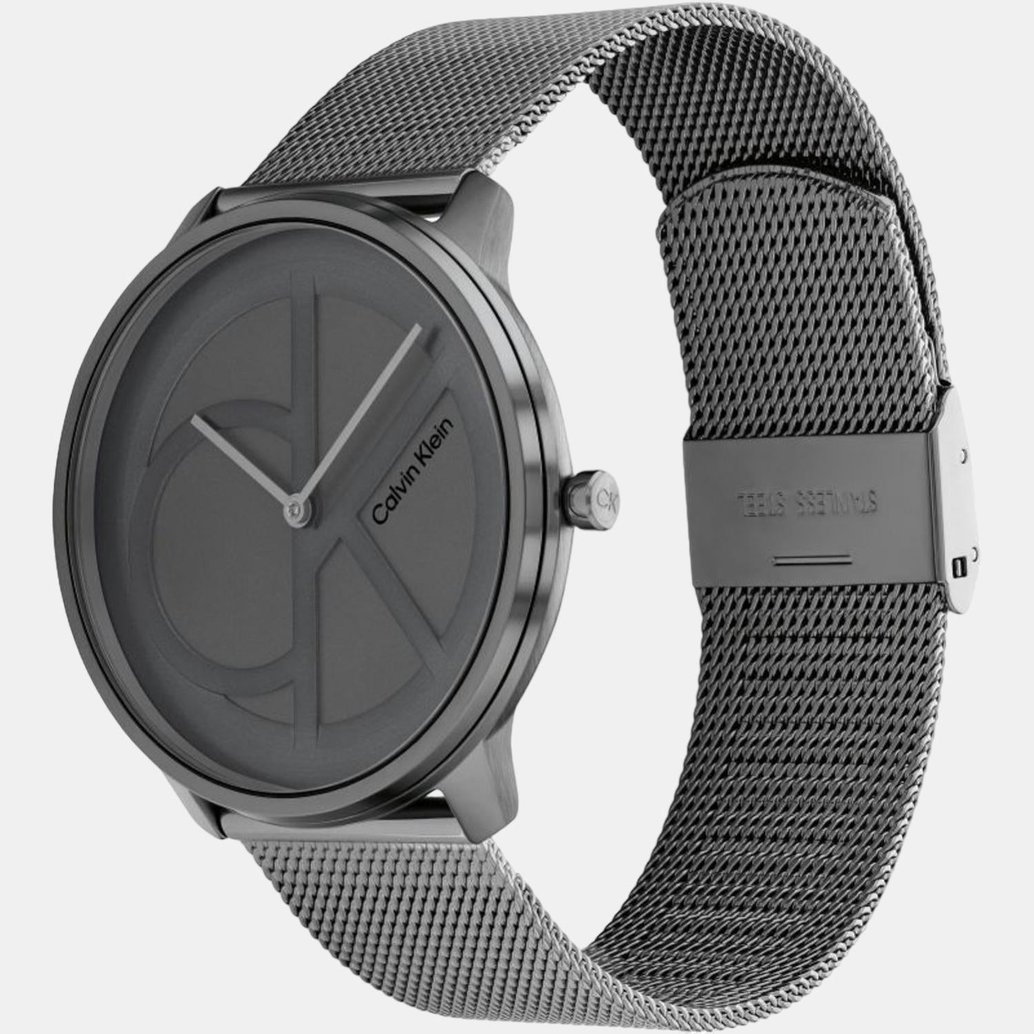Side view of Calvin Klein quartz watch with mesh strap and case profile