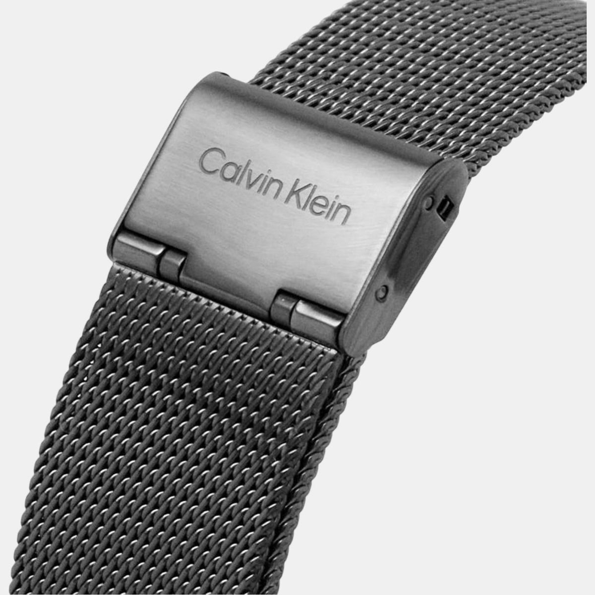Close-up of Calvin Klein gunmetal mesh strap with buckle clasp