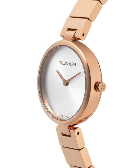 Side view of Calvin Klein Authentic watch showing rose gold case profile and crown