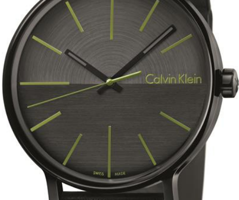 Close-up detail of Calvin Klein Boost dial showing minimalist design with lime markers