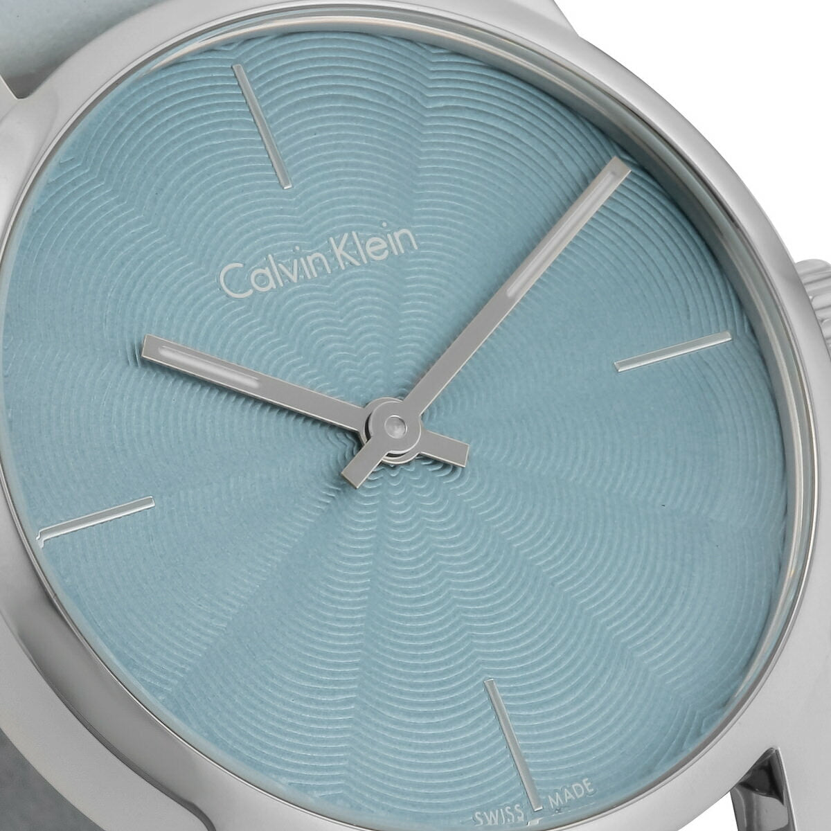 Calvin Klein City dial detail showing textured blue face with silver hour markers