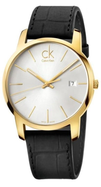 Calvin Klein City gold watch with white dial and black leather strap on wrist