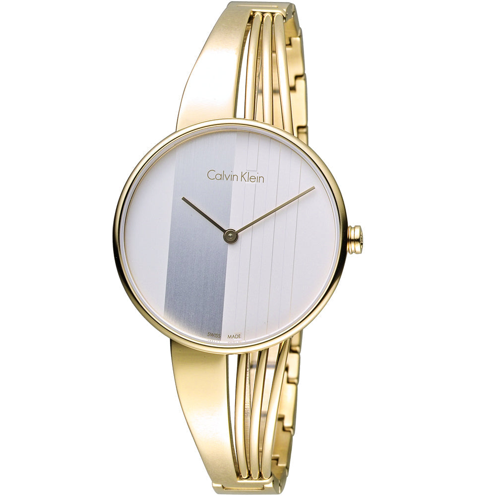 Gold watch with silver dial featuring vertical line design and bangle strap