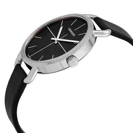 Side profile of Calvin Klein Even watch with black leather strap and silver case