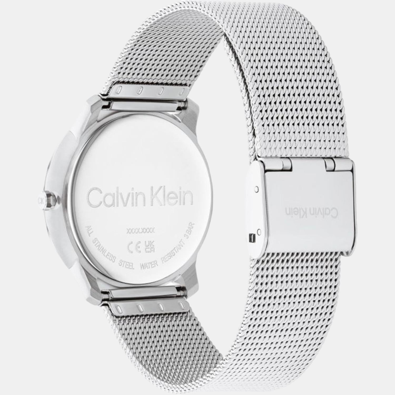 Calvin Klein Iconic watch angled view showing silver mesh band and caseback