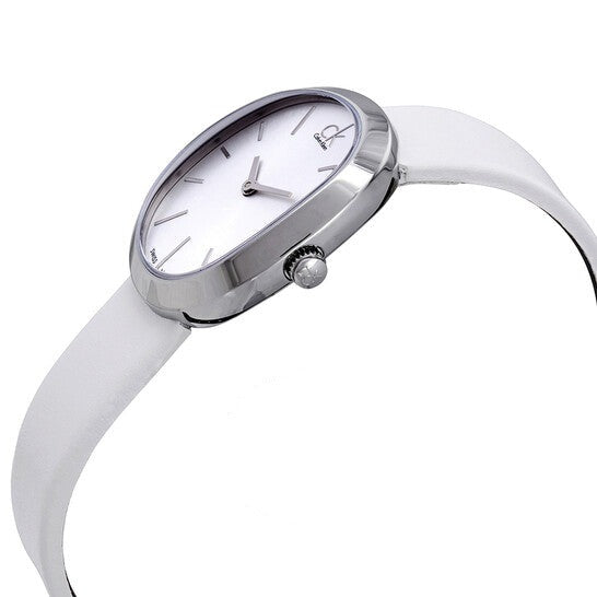 Calvin Klein Incentive women's watch worn on wrist with white leather strap