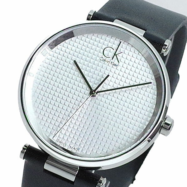 Calvin Klein Sight men's watch on wrist showing silver textured dial and black strap