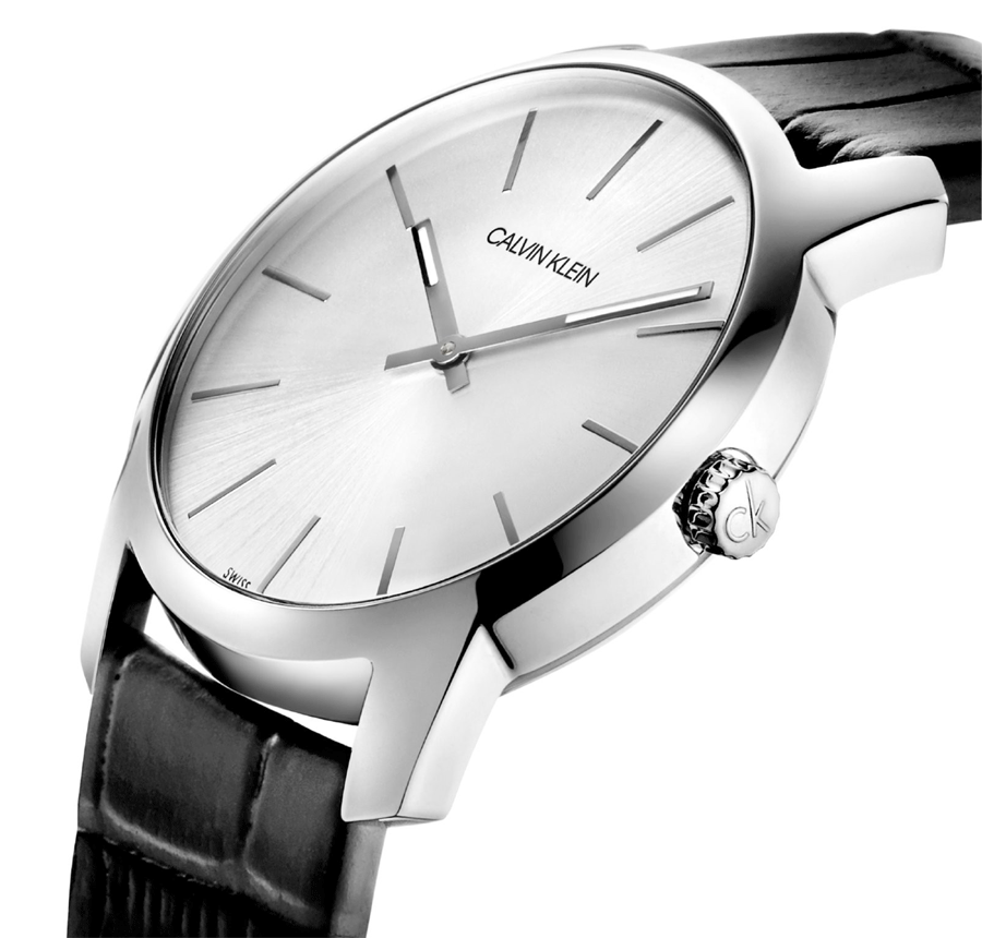 Side view of Calvin Klein white dial watch with stainless steel case and black strap