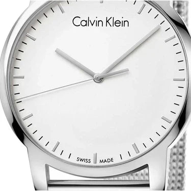 Close-up of Calvin Klein City watch dial with hour markers and Swiss Made text
