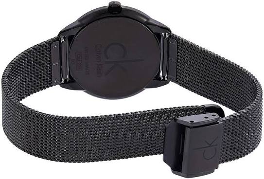 Back of Calvin Klein K3M22421 watch showing caseback with black mesh strap