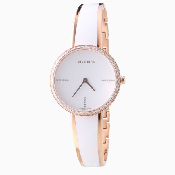 Side angle view of Calvin Klein Seduce watch with white and rose gold-tone two-tone design