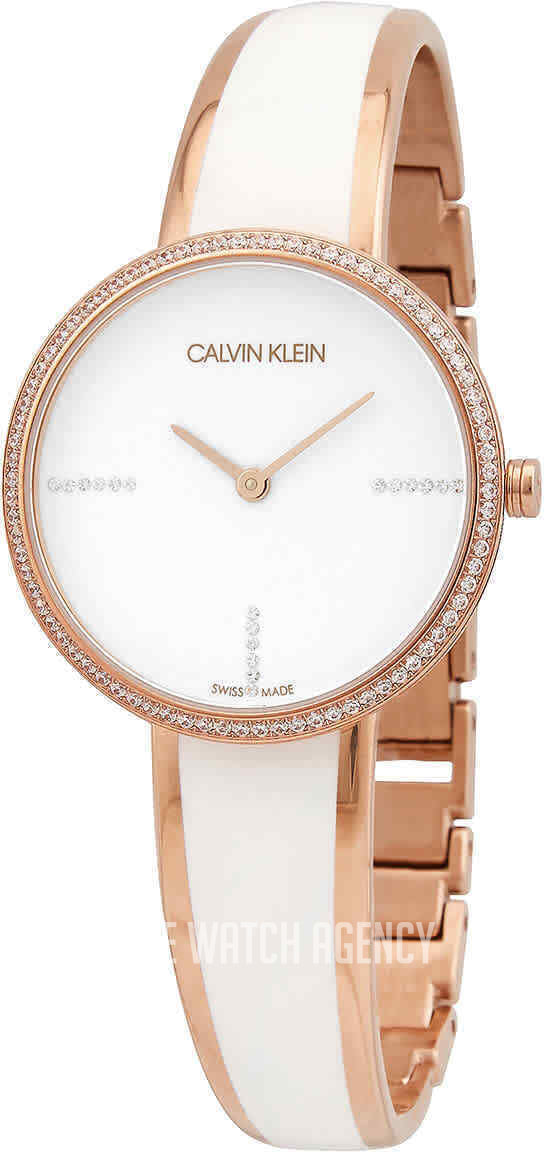 Calvin Klein Seduce white dial quartz ladies watch with rose gold-tone crystal-set bezel and white leather strap