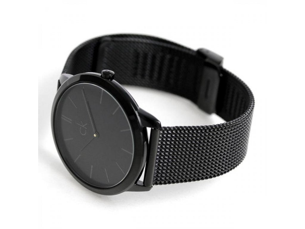Angled view of Calvin Klein Minimal watch with black mesh metal bracelet