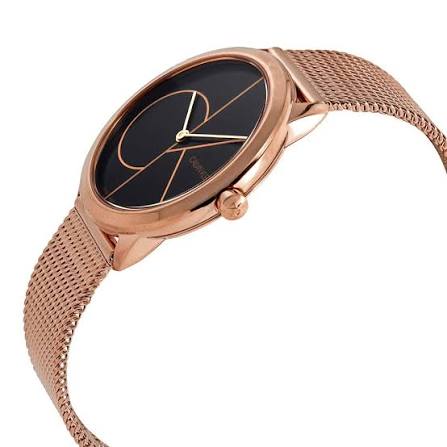 Side angle view of Calvin Klein Minimal watch with black dial and rose gold mesh bracelet