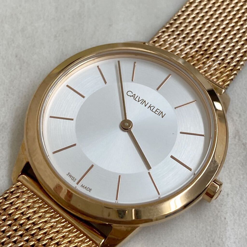 Calvin Klein Minimal K3M22626 watch dial detail showing minimalist silvered face and rose gold hands