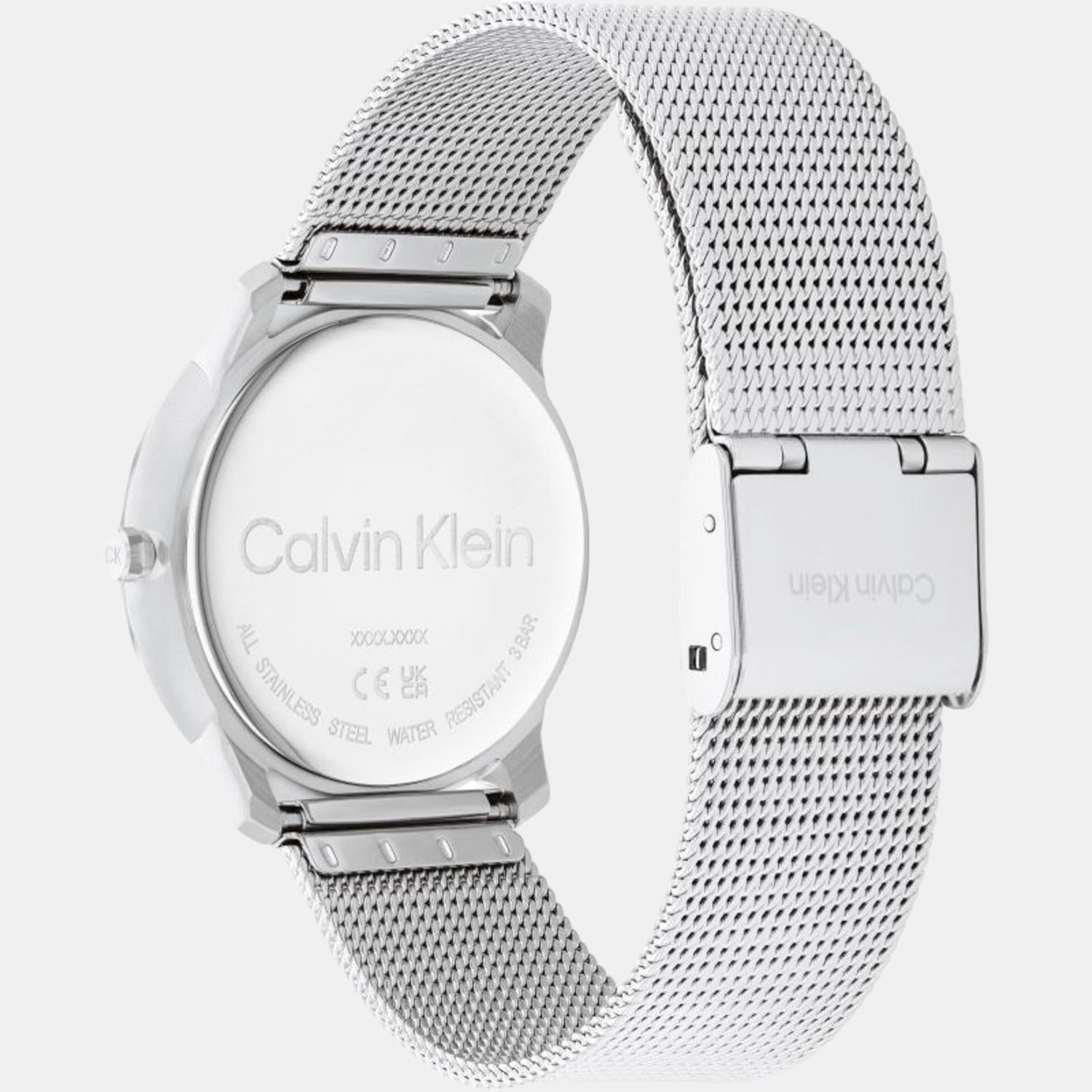 Side profile of Calvin Klein Stately watch with silver mesh band and fold-over clasp