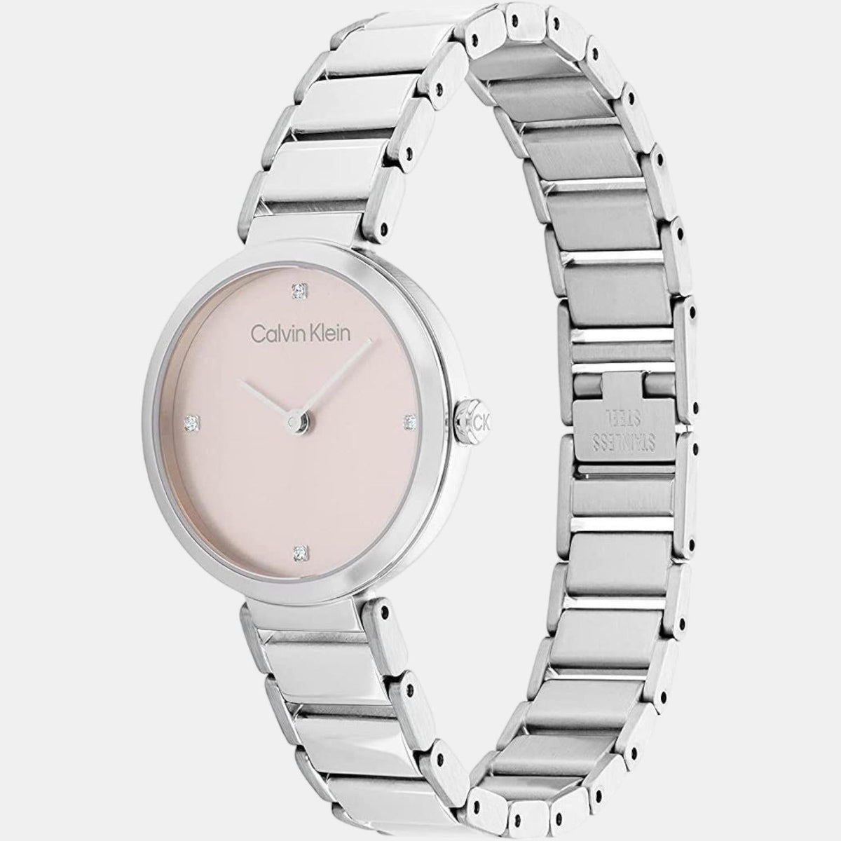 Calvin Klein Stately watch angled view showing nude dial and silver link bracelet