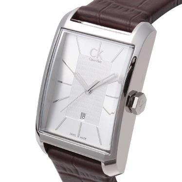 Calvin Klein Window watch angled view with silver dial and brown leather strap