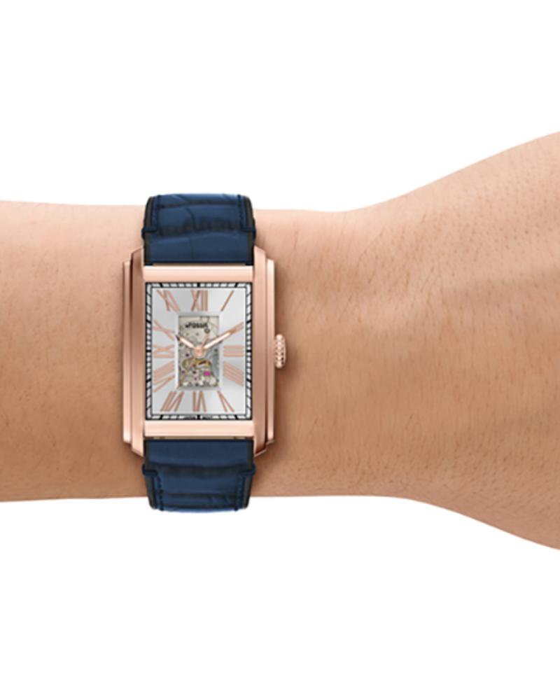 Carraway ME3274 automatic watch worn on wrist showing rectangular rose gold case and blue crocodile strap