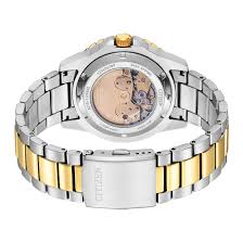 Watch case back showing two-tone steel and gold strap design