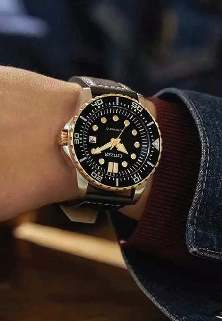 Citizen automatic watch worn on wrist showing dial and case details
