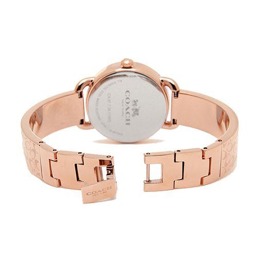 Coach Delancey rose-gold watch caseback and strap detail showing Coach branding