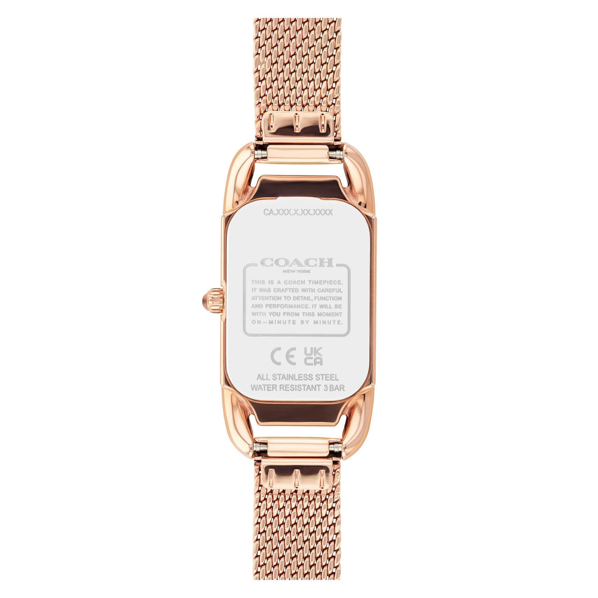 Coach watch caseback showing model number, regulatory marks, and stainless steel construction