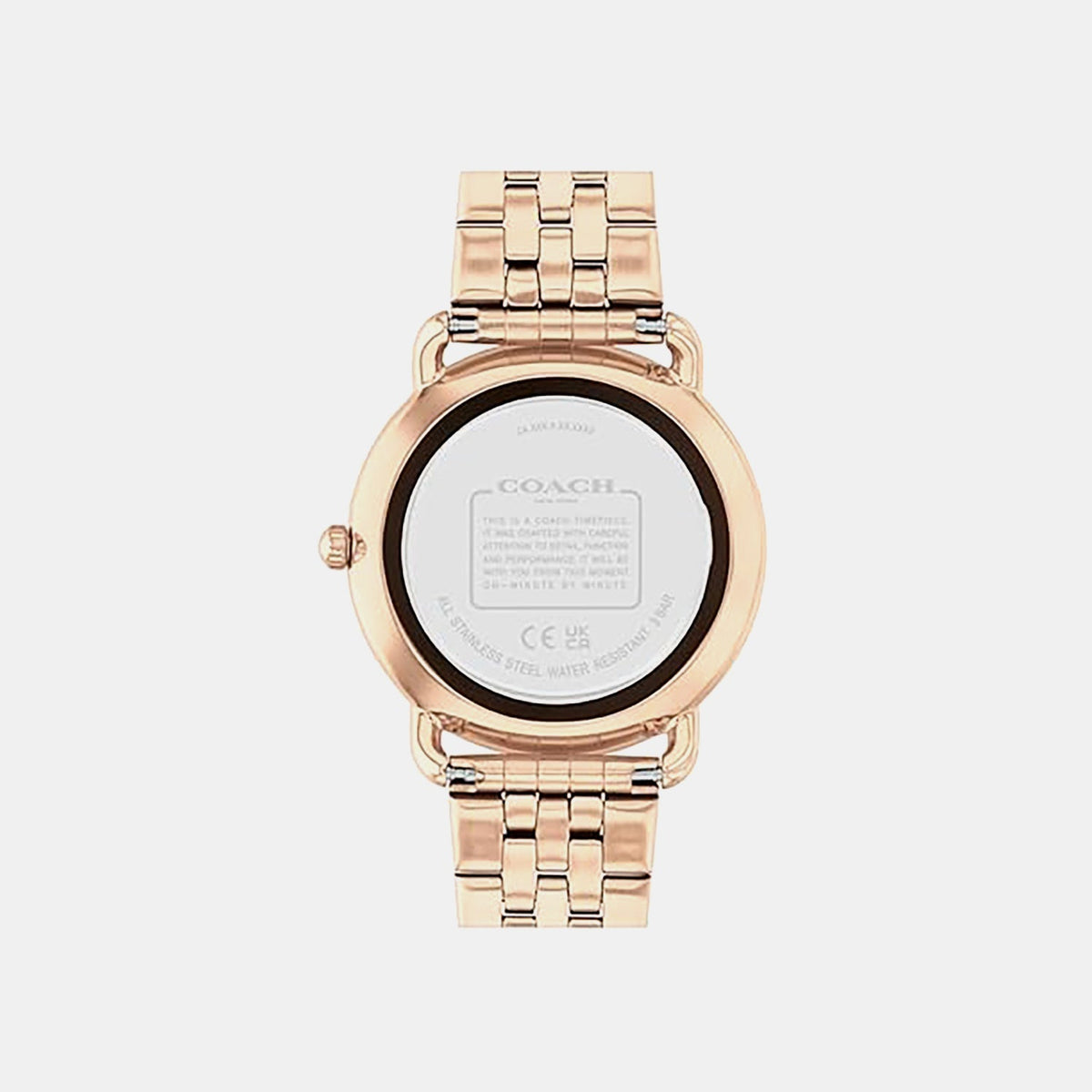 Coach rose gold women's watch caseback showing stainless steel case back with engraved Coach branding