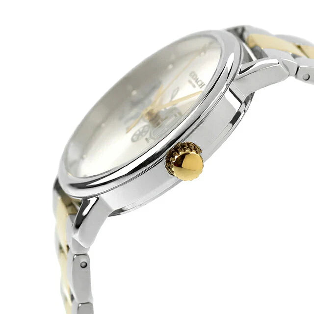 Side view of Coach watch showing 2-tone bracelet and gold-tone crown detail
