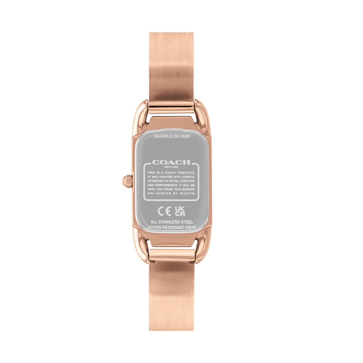 Coach Cadie caseback showing stainless steel case with regulatory markings and branding