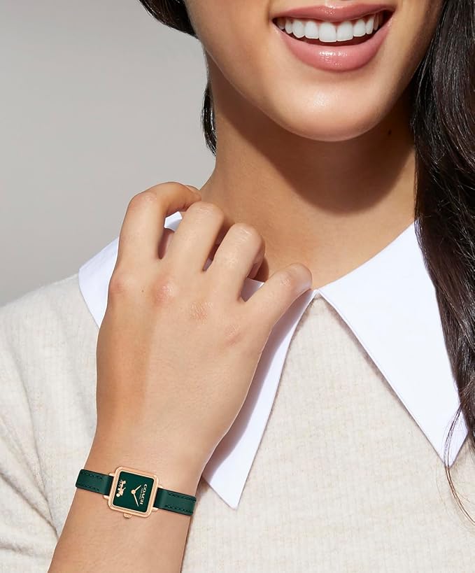 Coach Cass ladies watch worn on wrist showing green dial and leather strap