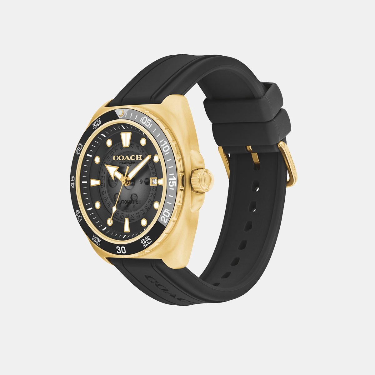 Coach Charter automatic watch worn on wrist with gold case and black silicone strap