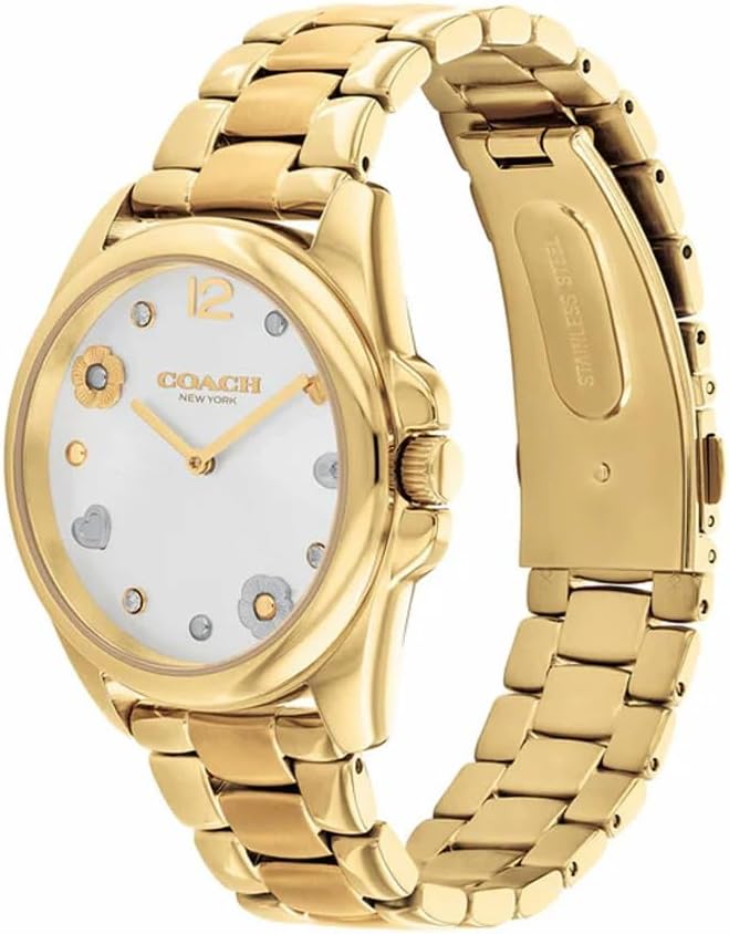 Coach Greyson gold-plated stainless steel bracelet watch shown at angle with silver dial