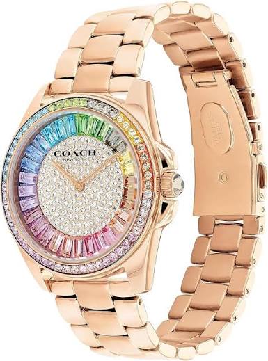 Coach Greyson rose gold watch with rainbow dial shown at angle with full bracelet visible