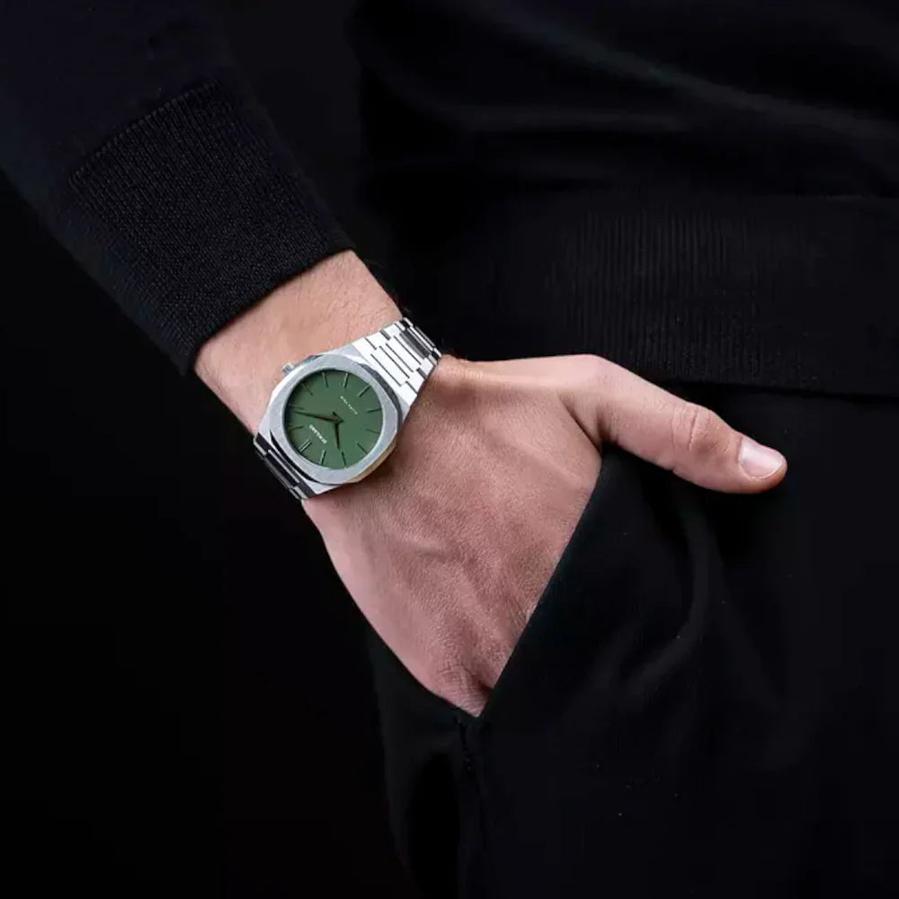 D1 Milano UTBJ06 Ultra Thin watch worn on wrist with green dial visible