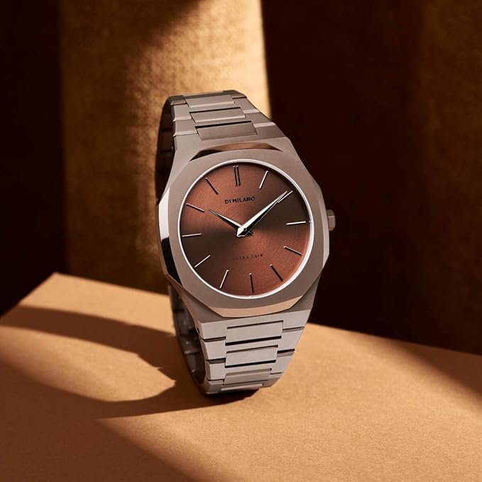 D1 Milano UTBJ10 rose gold watch worn on wrist with brown dial visible