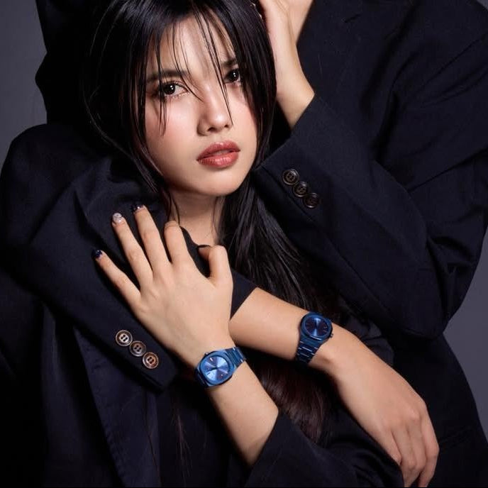 D1 Milano UTBL33 ultra-thin blue watch worn on wrist with black outfit