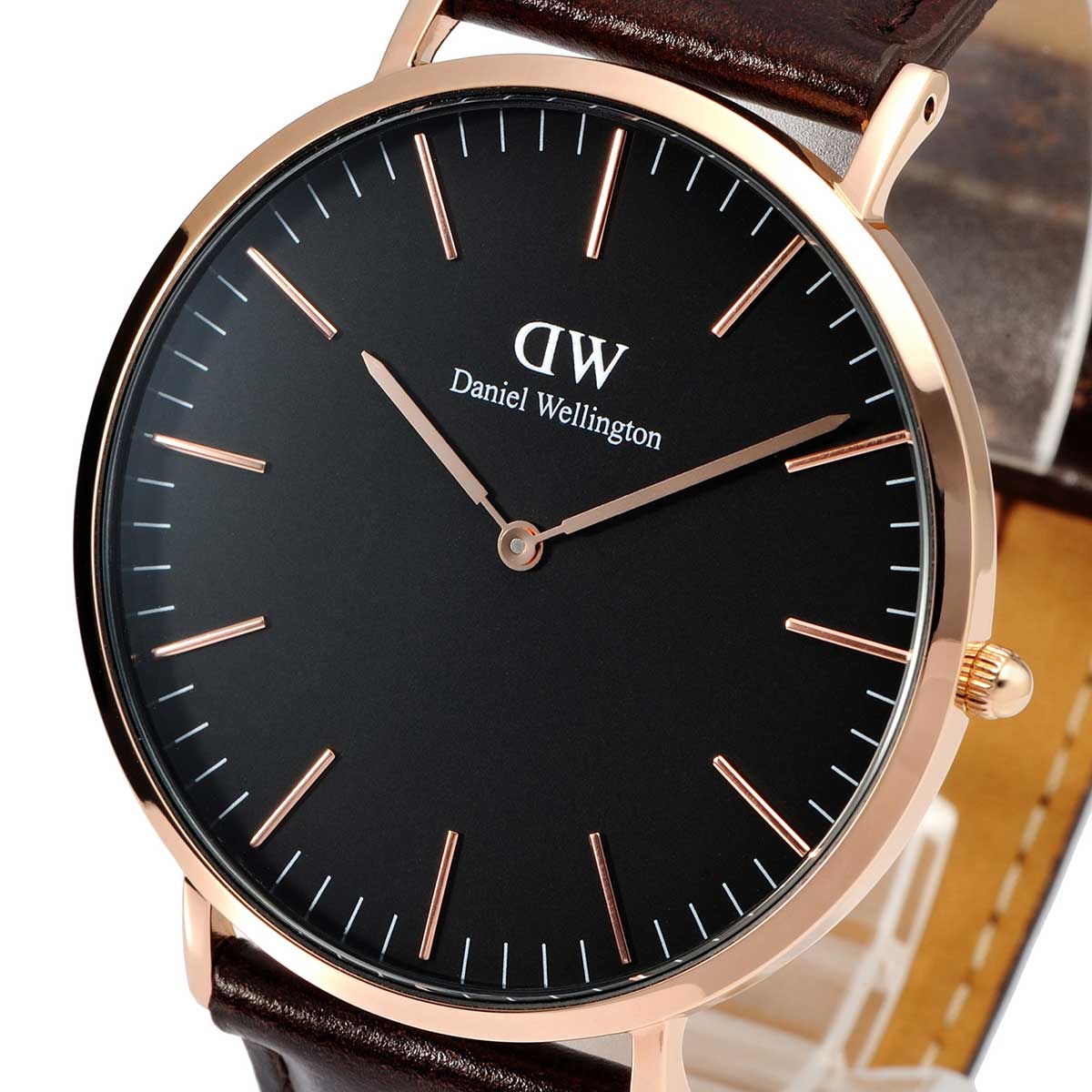 Close-up of Daniel Wellington Bristol watch dial with gold indices and rose gold hands