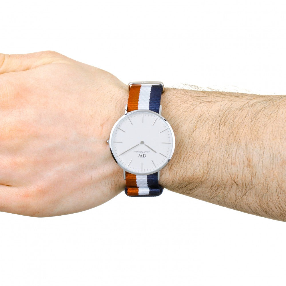 Daniel Wellington Cambridge 40mm watch worn on wrist with tricolour fabric strap
