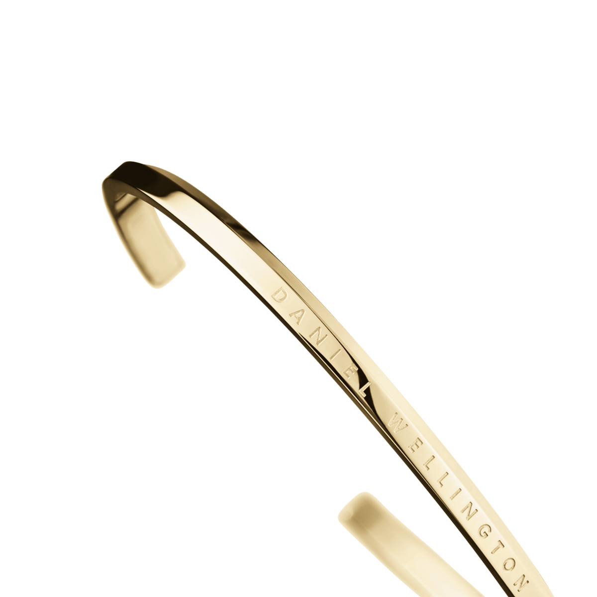 Detail of gold bracelet opening and engraved Daniel Wellington branding