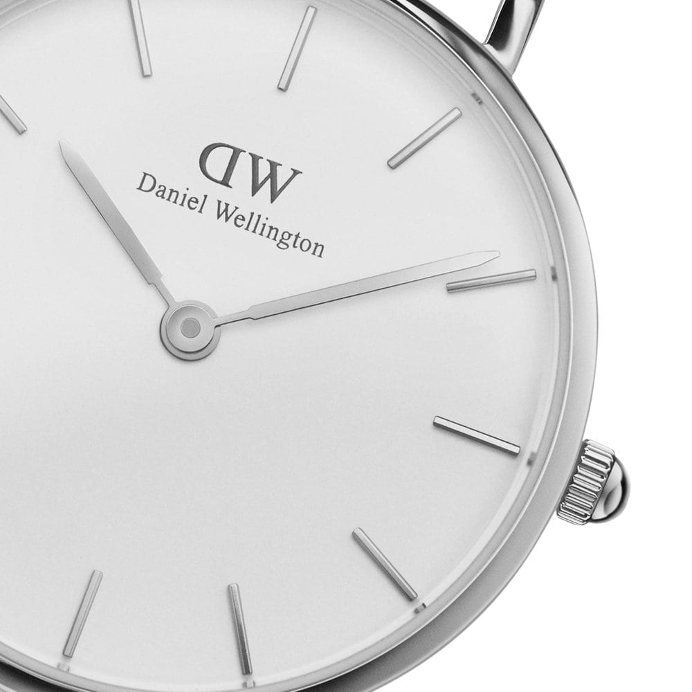 Closeup of Daniel Wellington Classic Petite Sheffield white dial with silver hour markers