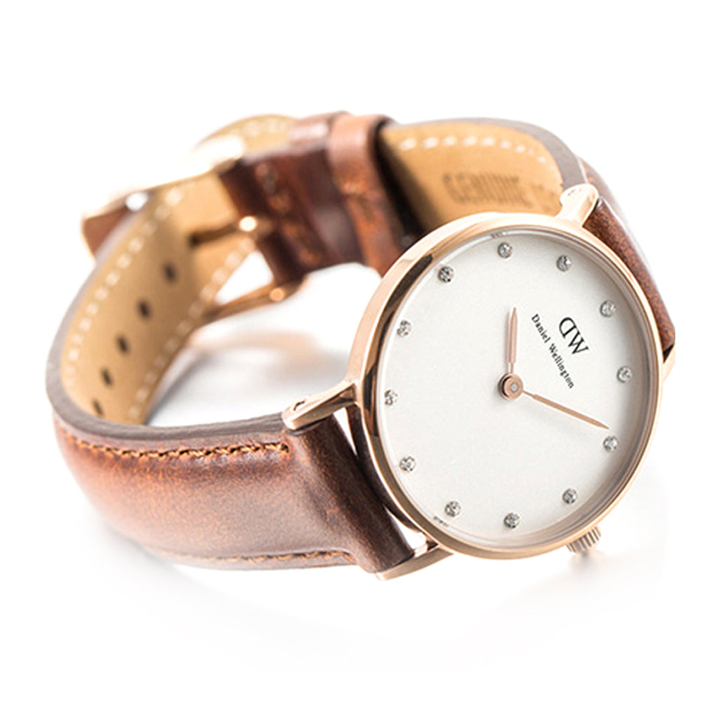 Daniel Wellington Classy St Mawes 26mm watch at angle showing rose gold case, leather strap, and dial detail