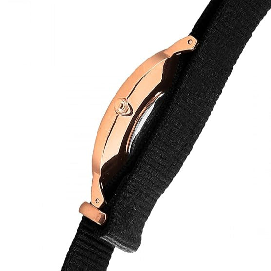Side profile of rose gold case with black nylon strap showing watch thickness